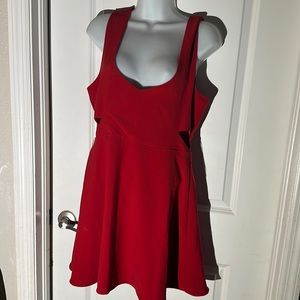 Red above the knee dress with side cut outs